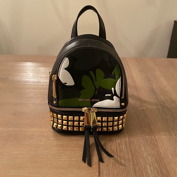 Michael Kors Handbags - Rare Michael Kors mini studded leather backpack